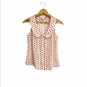 Bar III sleeveless polka dot blouse.